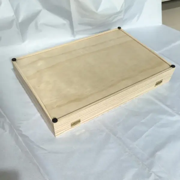 wooden storage box with hinged lid
