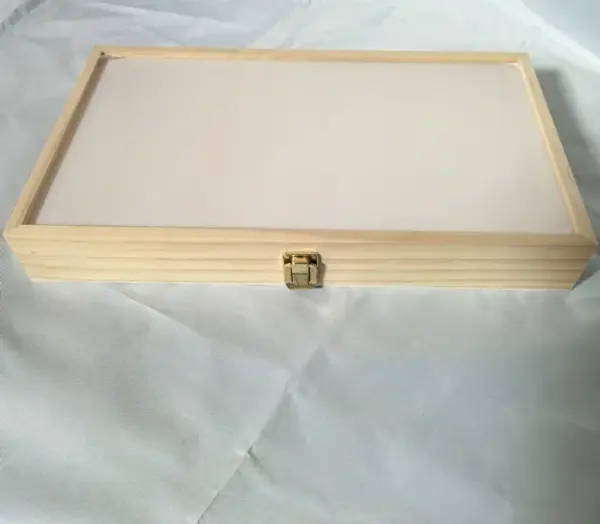 Clear-top wooden boxes with a locking clasp.