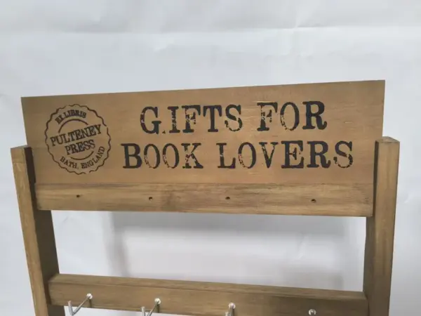 wooden display stand with signs
