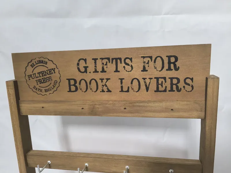 wooden display stand with signs
