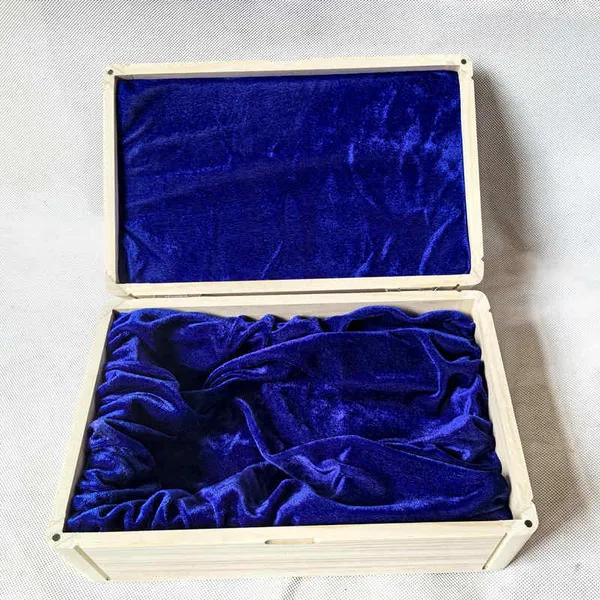 Wooden box with blue velvet lining