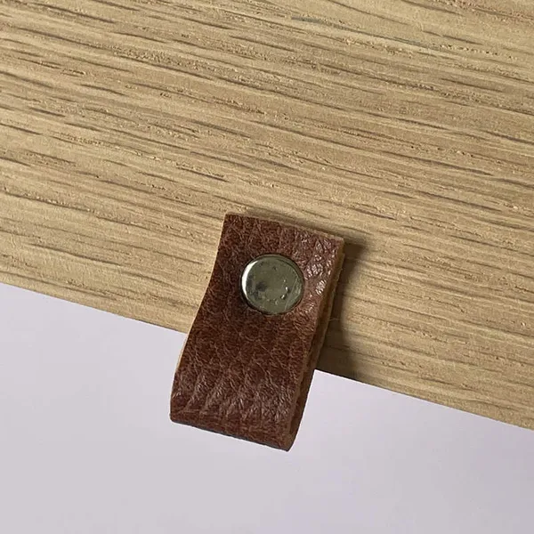 pen holder on wooden clipboard