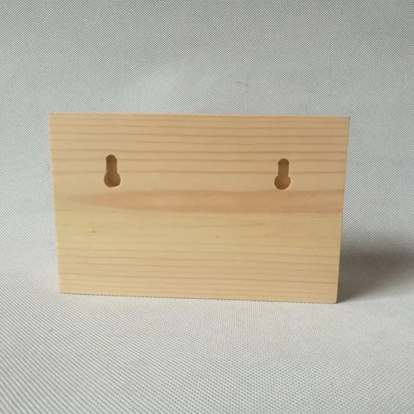 Wooden test tube plant holder with two hanging holes on the back