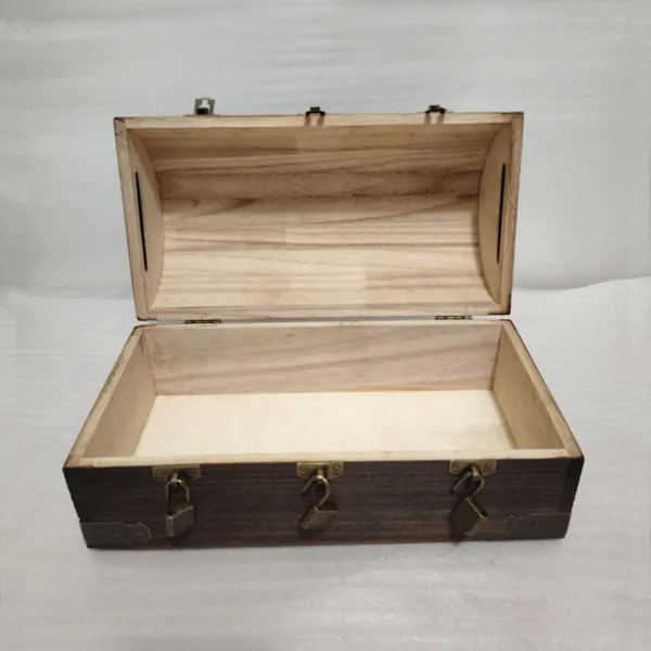 Opened arched wooden chest has 3 locks
